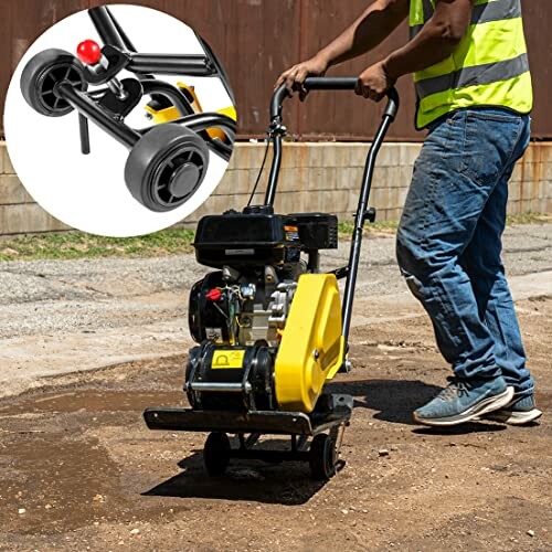 Worker using a yellow plate compactor on a dirt surface